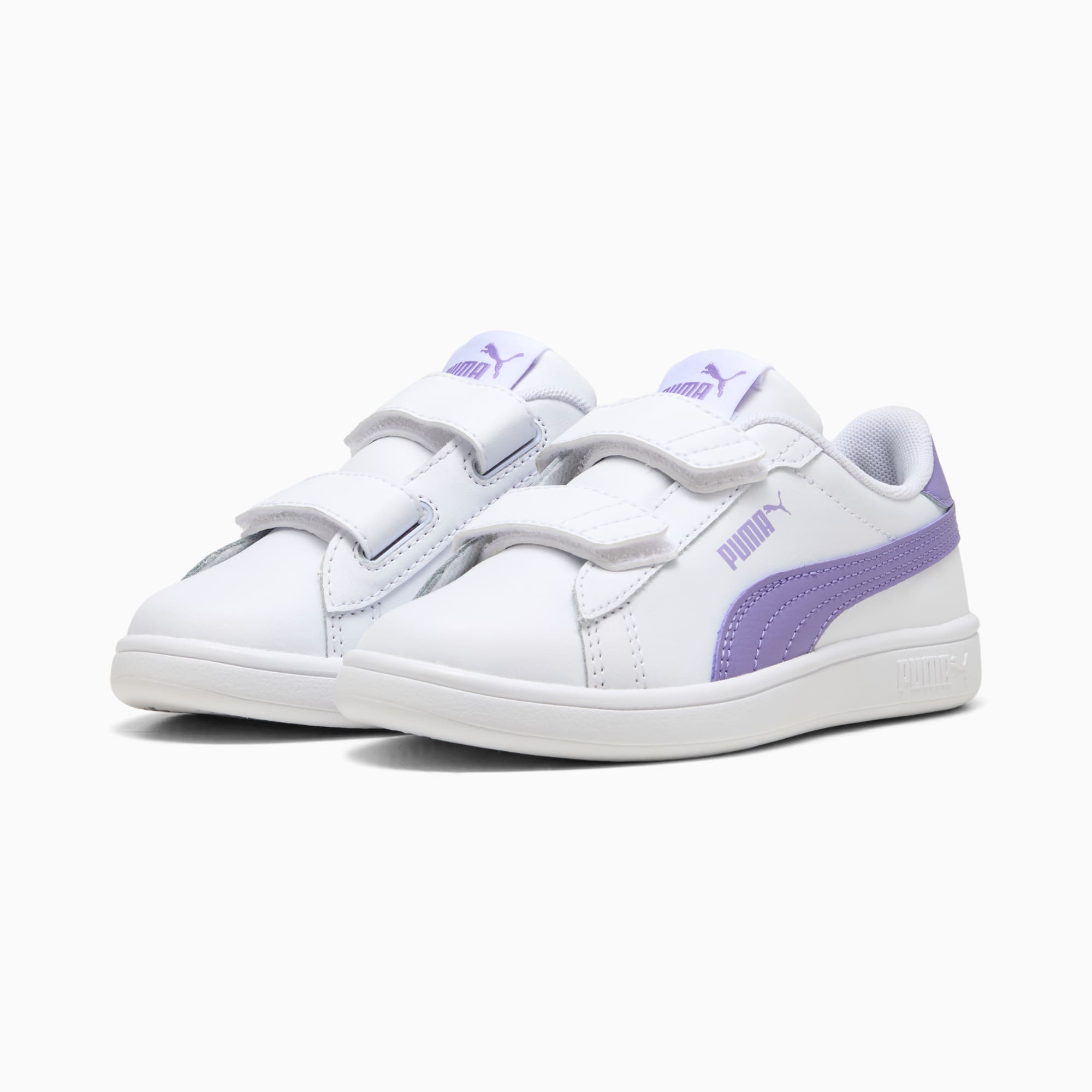 White PUMA trainer for kids with lilac accents and touch-fastening straps.