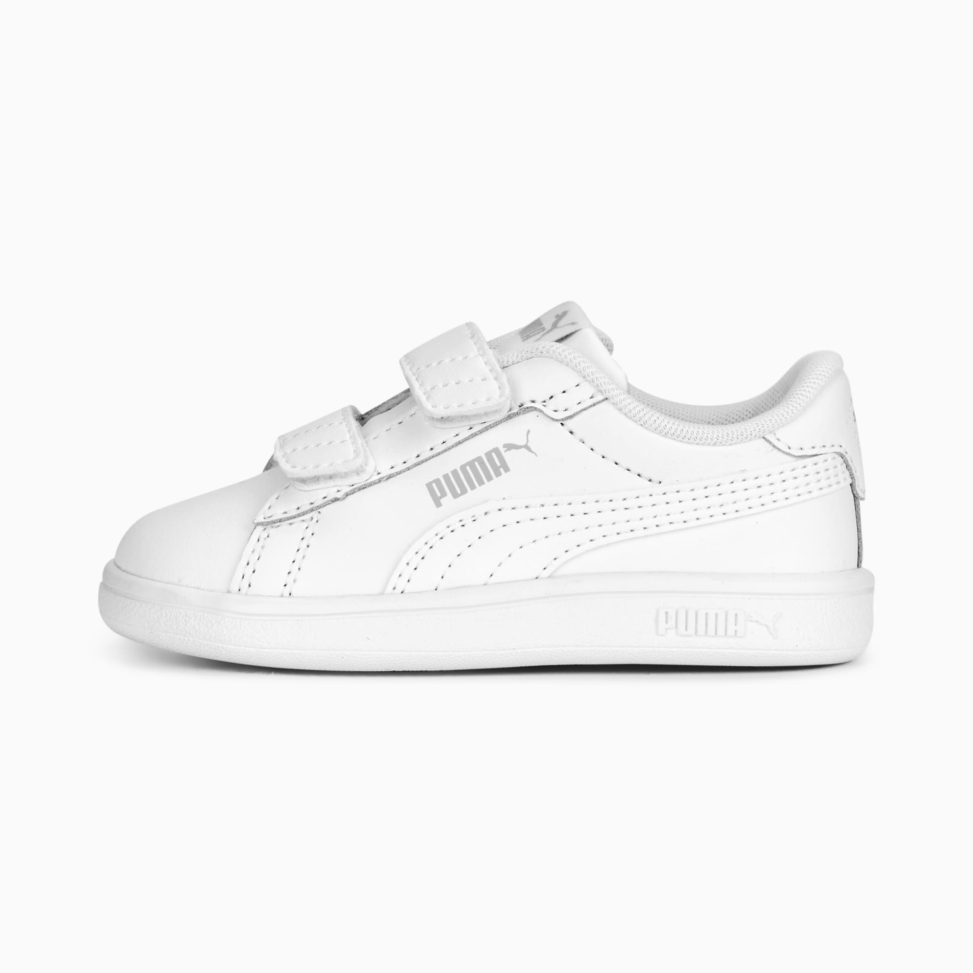 White PUMA trainer (child) with two hook-and-loop straps for closure.