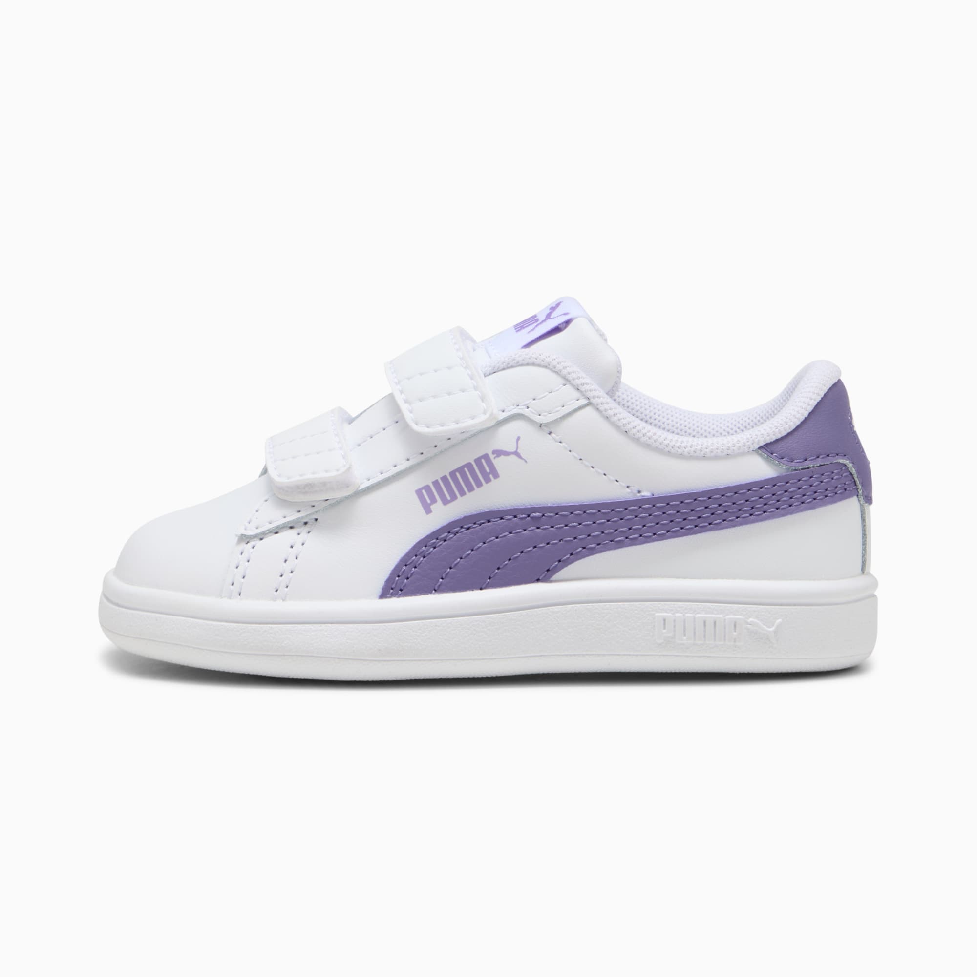 Witte PUMA-sneaker voor kinderen, met lila accenten en klittenbandsluitingen.