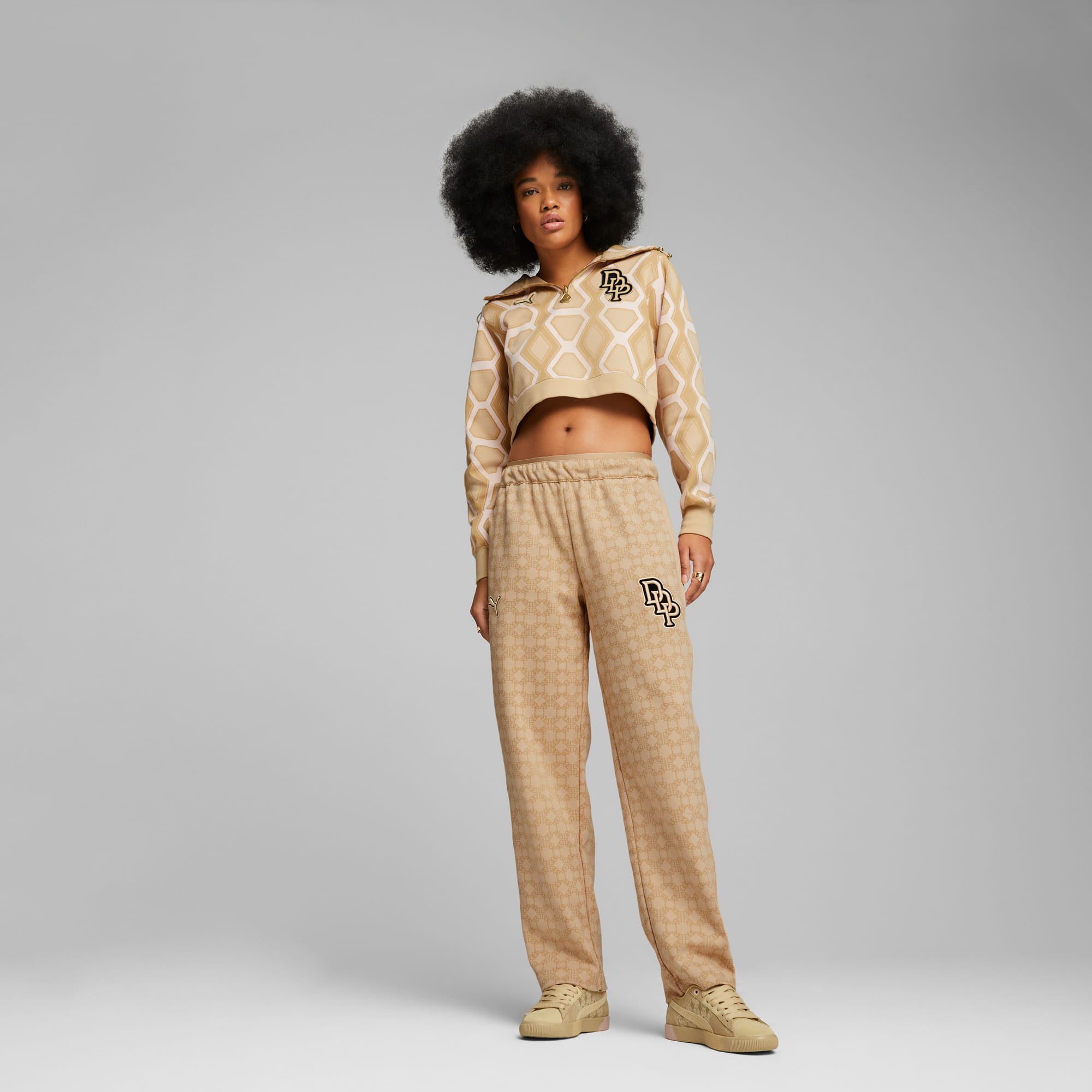 Nike all over logo best sale print joggers in camel