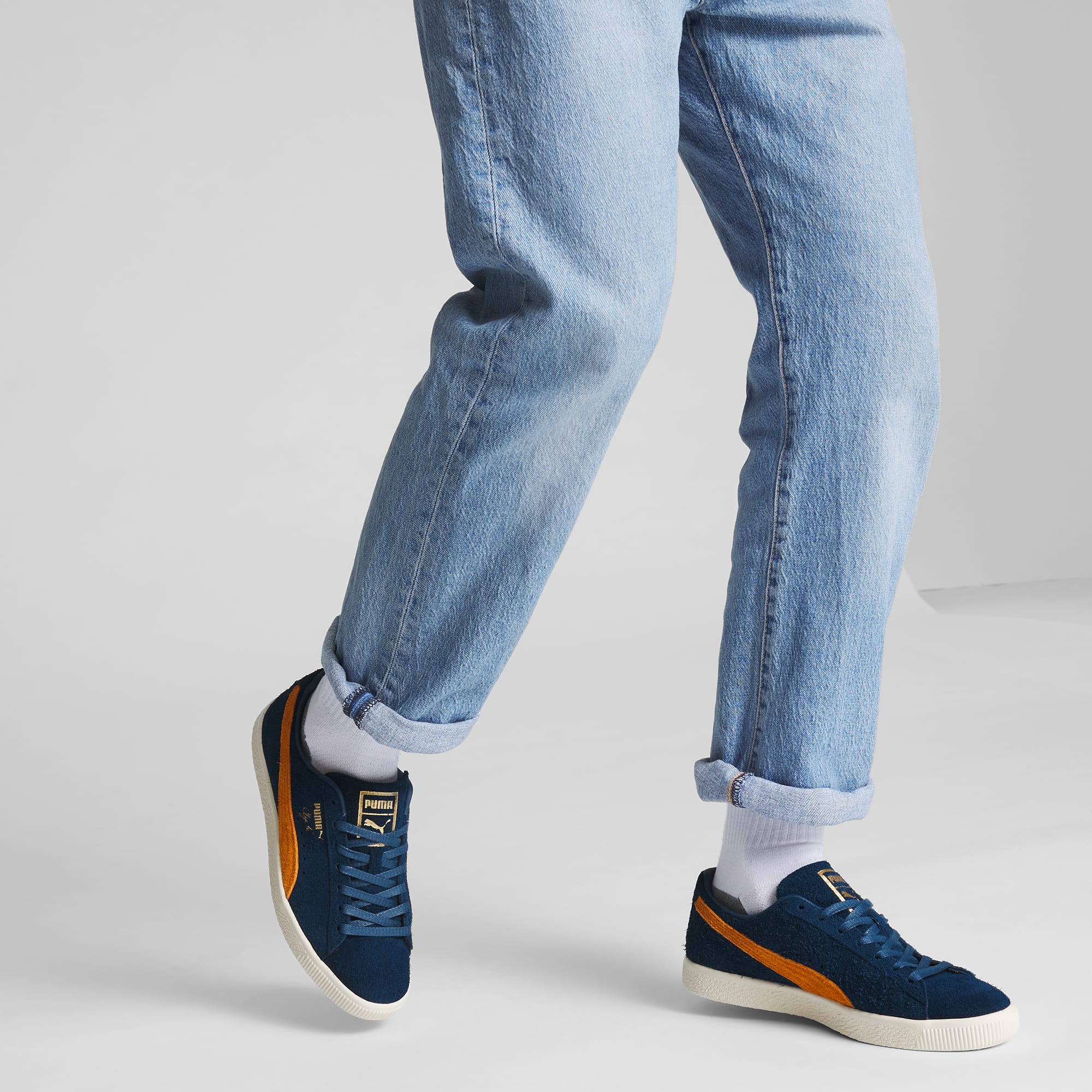 Zapatos puma top historia jeans