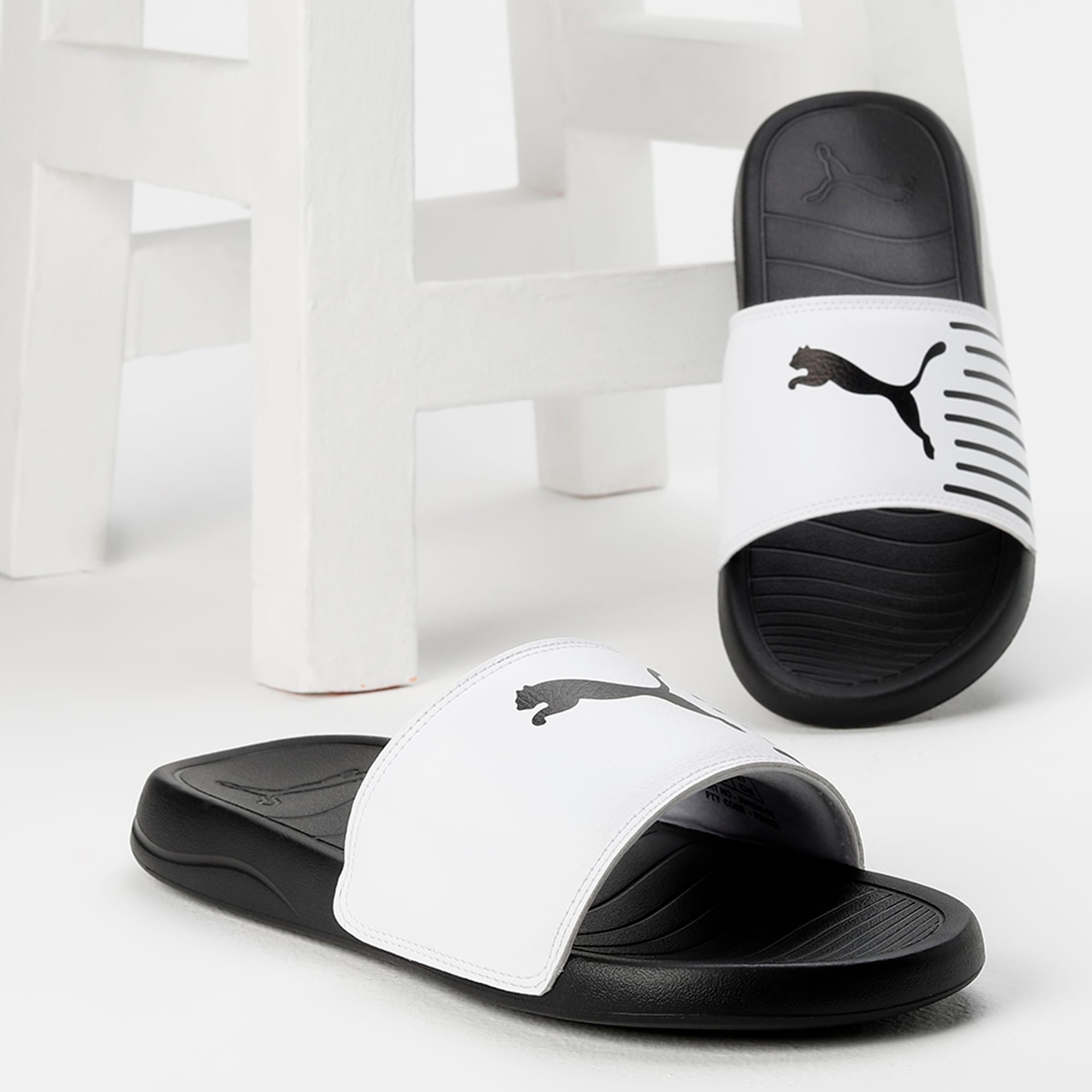 Puma black and white slides store