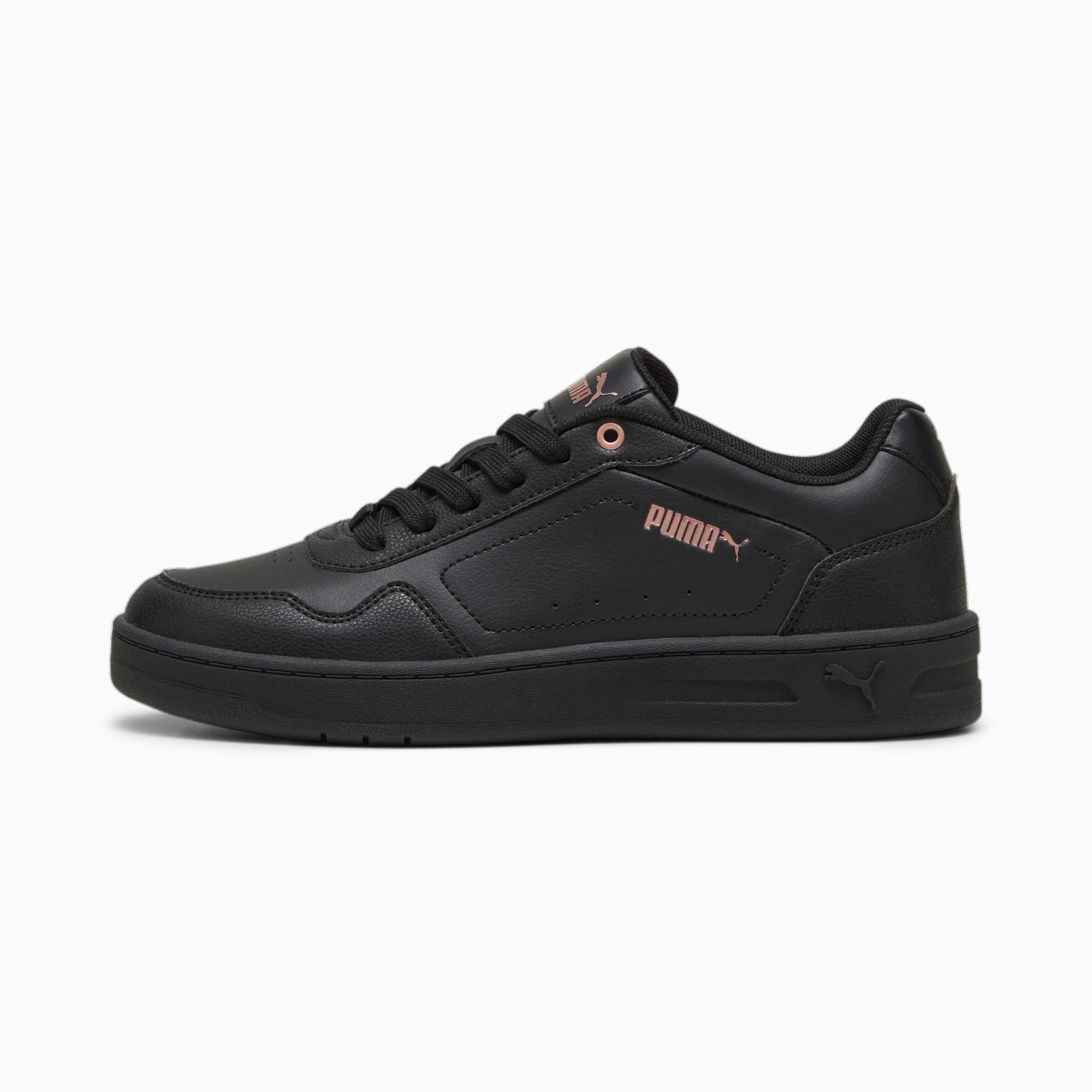 Sneakers nere PUMA da donna, a profilo basso e con logo discreto.