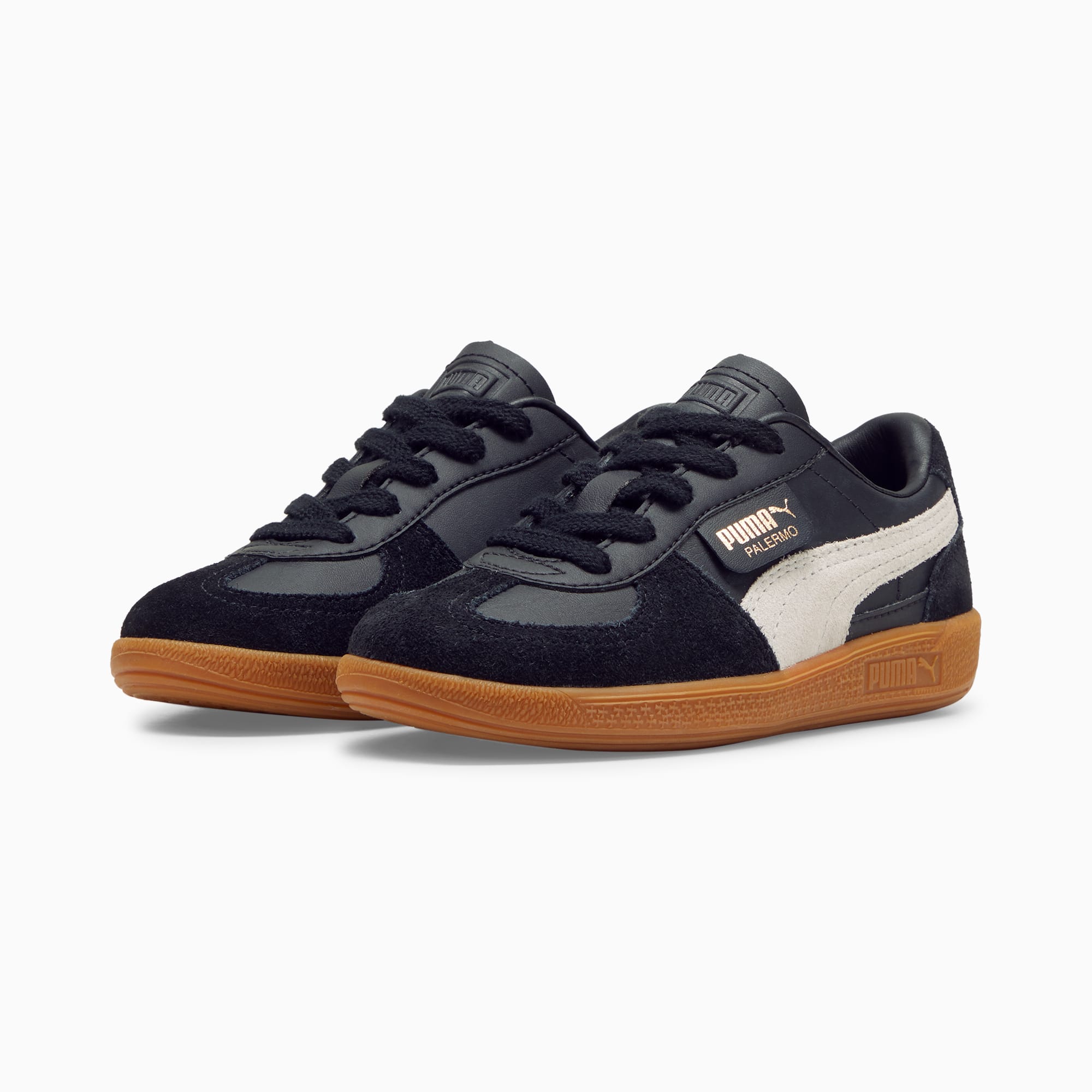 Baskets noires PUMA Palermo enfant avec dessus en daim et simili cuir, semelle gomme.