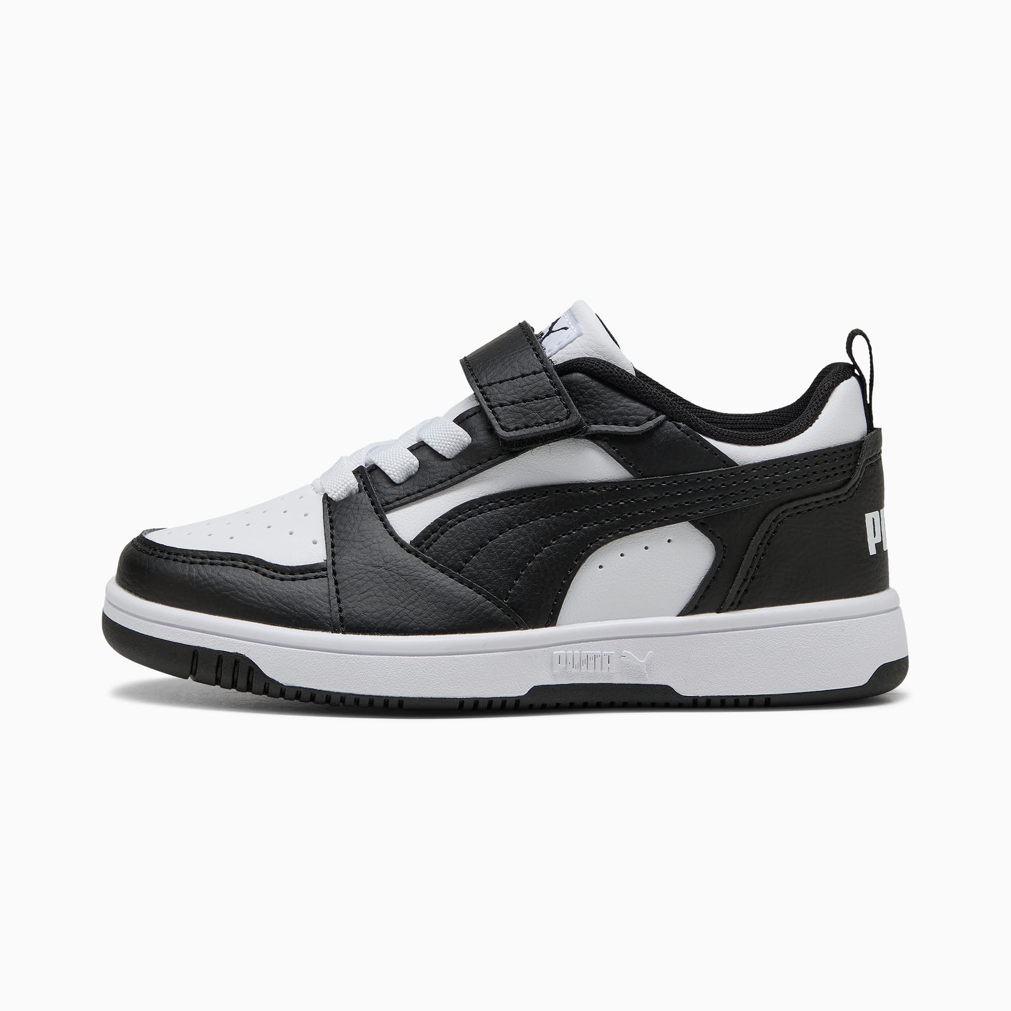 Sneaker PUMA nera e bianca per bambini con cinturino a strappo.