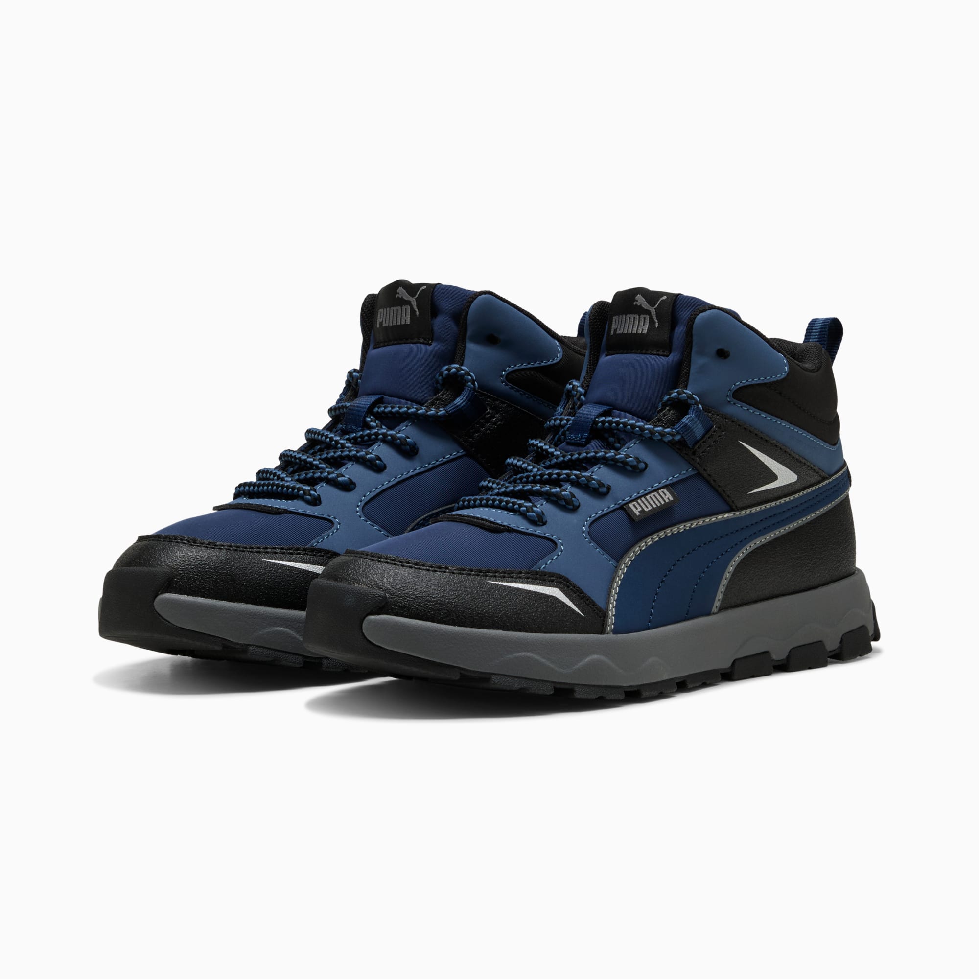 Blauer PUMA Stiefel für Jugendliche mit Schnürverschluss und High-Top-Design.
