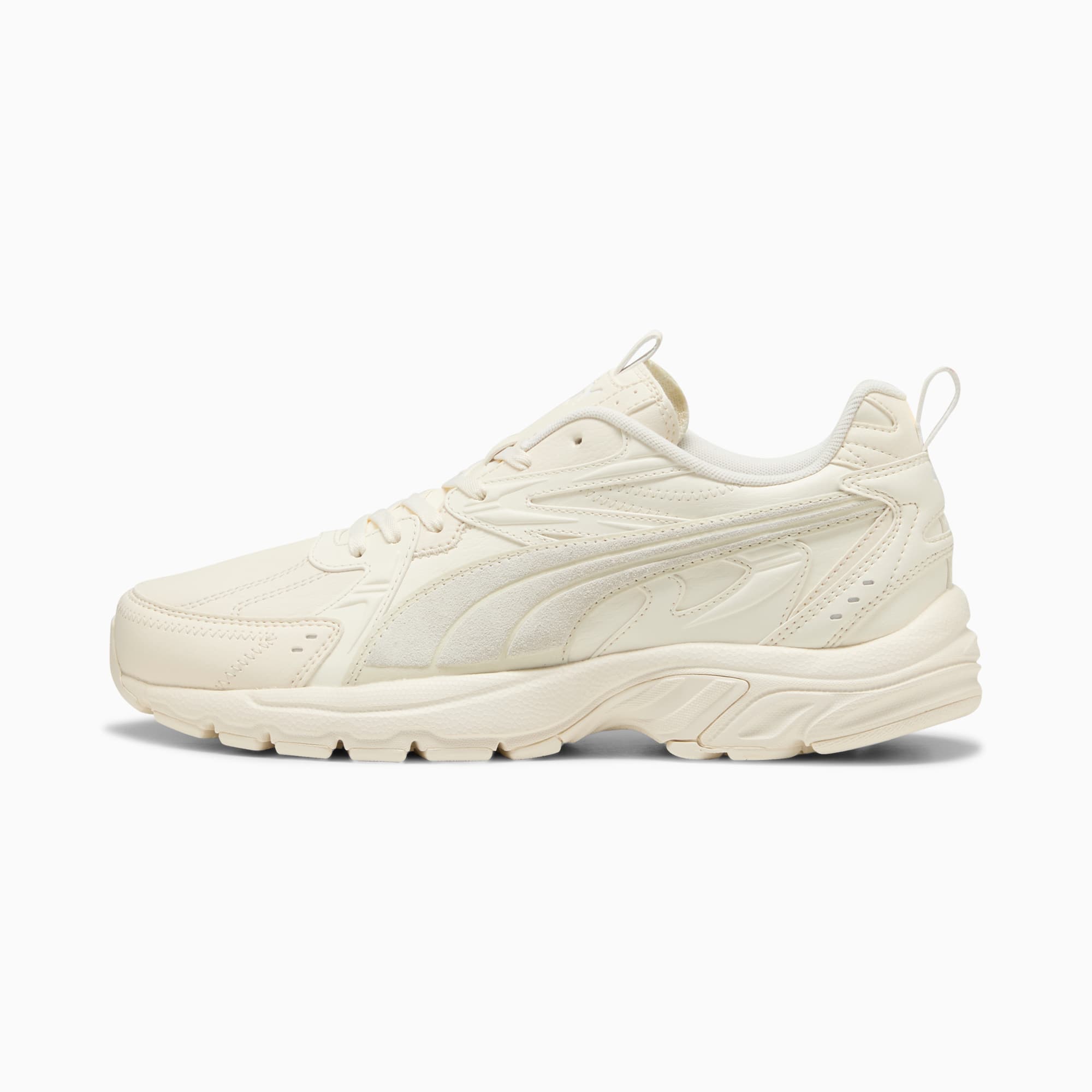 Cream PUMA unisex trainer with a textured sole and signature side stripe.