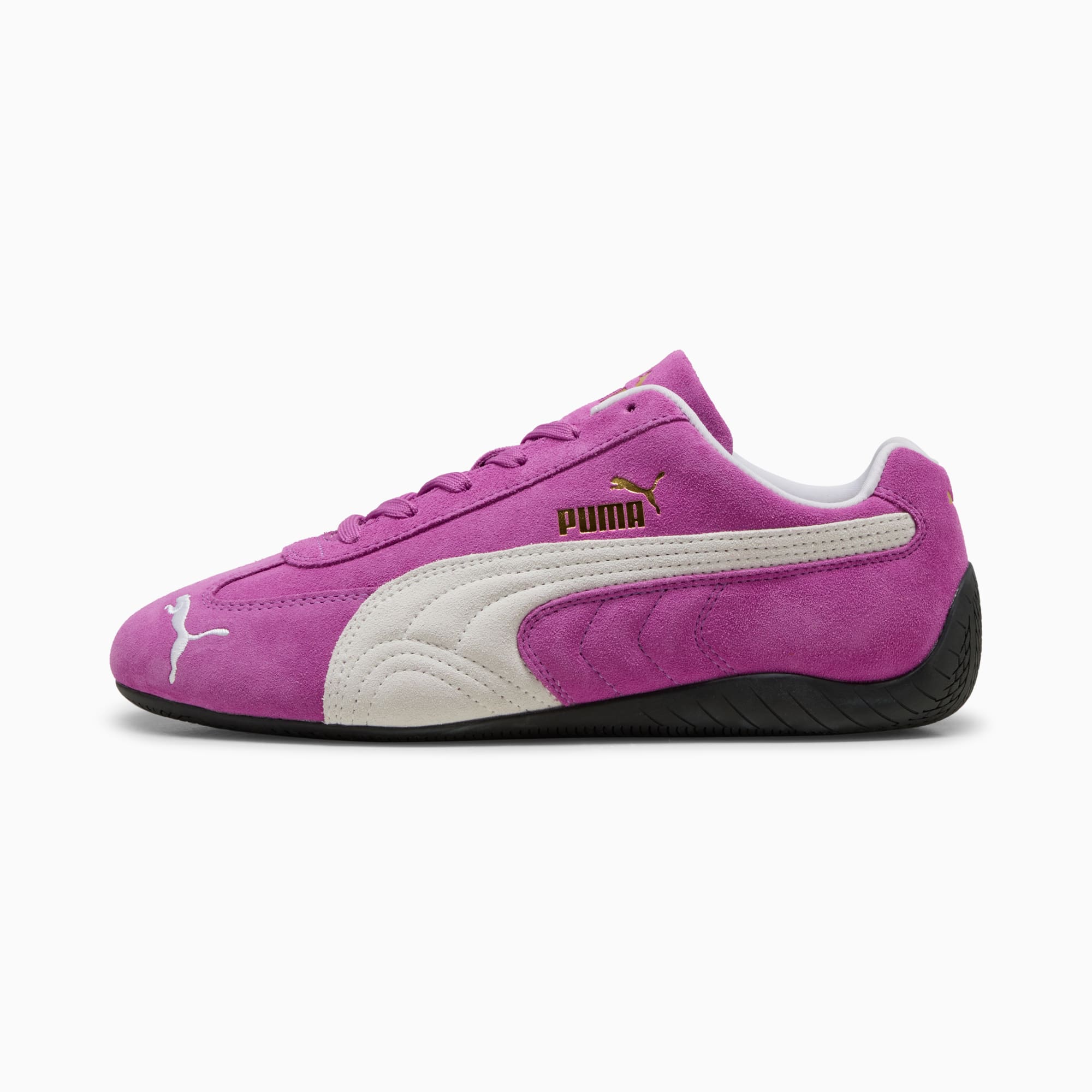 Chaussure magenta PUMA femme avec bande blanche et logo doré.