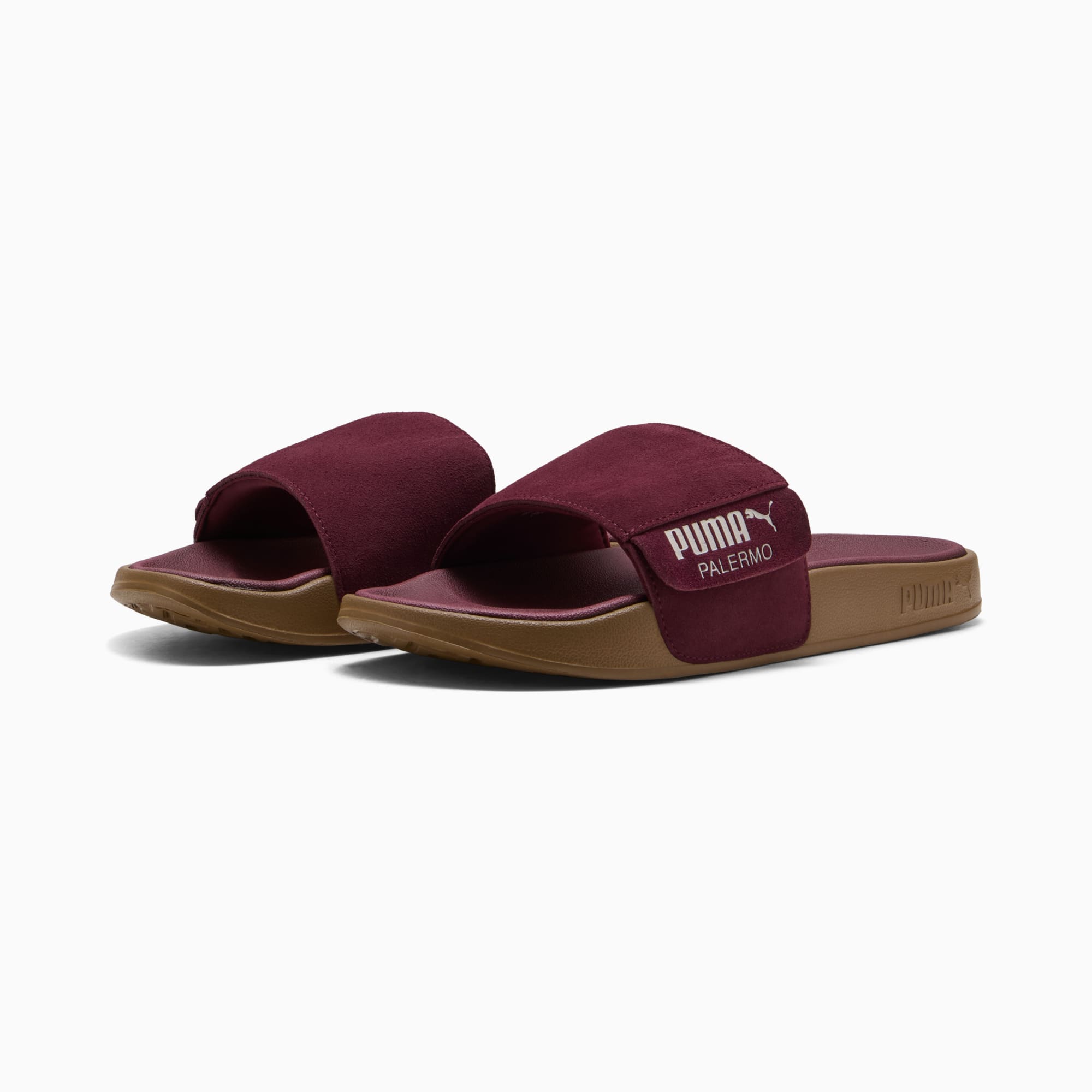 Sandales PUMA bordeaux pour adultes, avec large bride et logo.