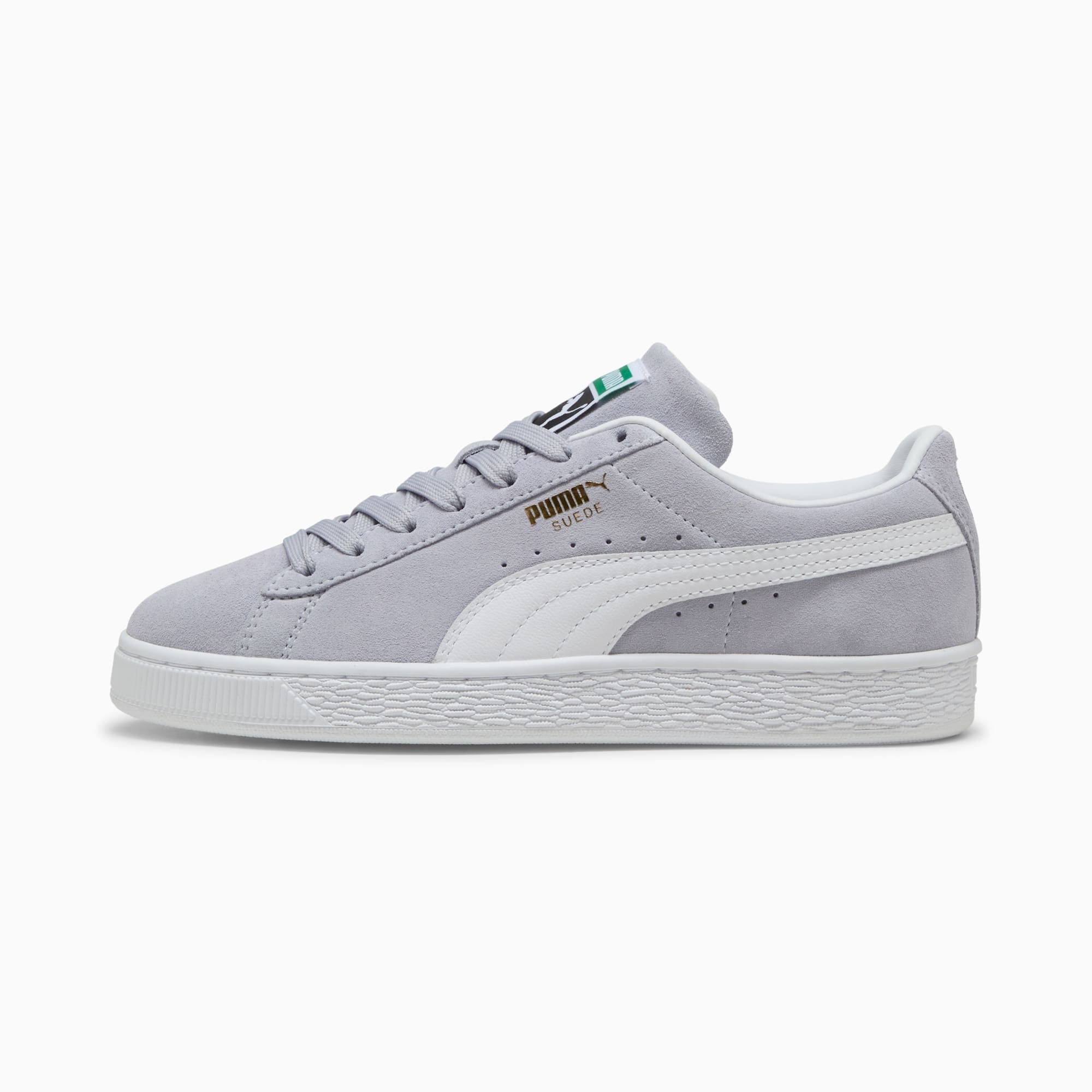Grijze PUMA Suede sneakers met witte Formstrip en gestructureerde zool voor volwassenen.