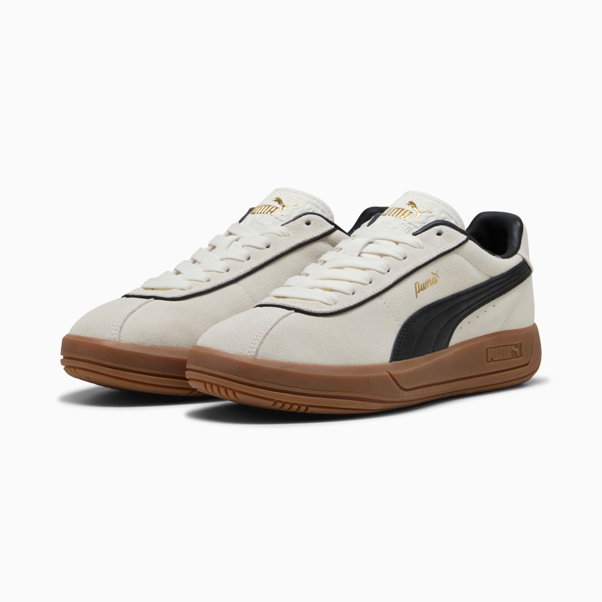 Basket crème PUMA homme avec bande noire et détails de semelle marron.