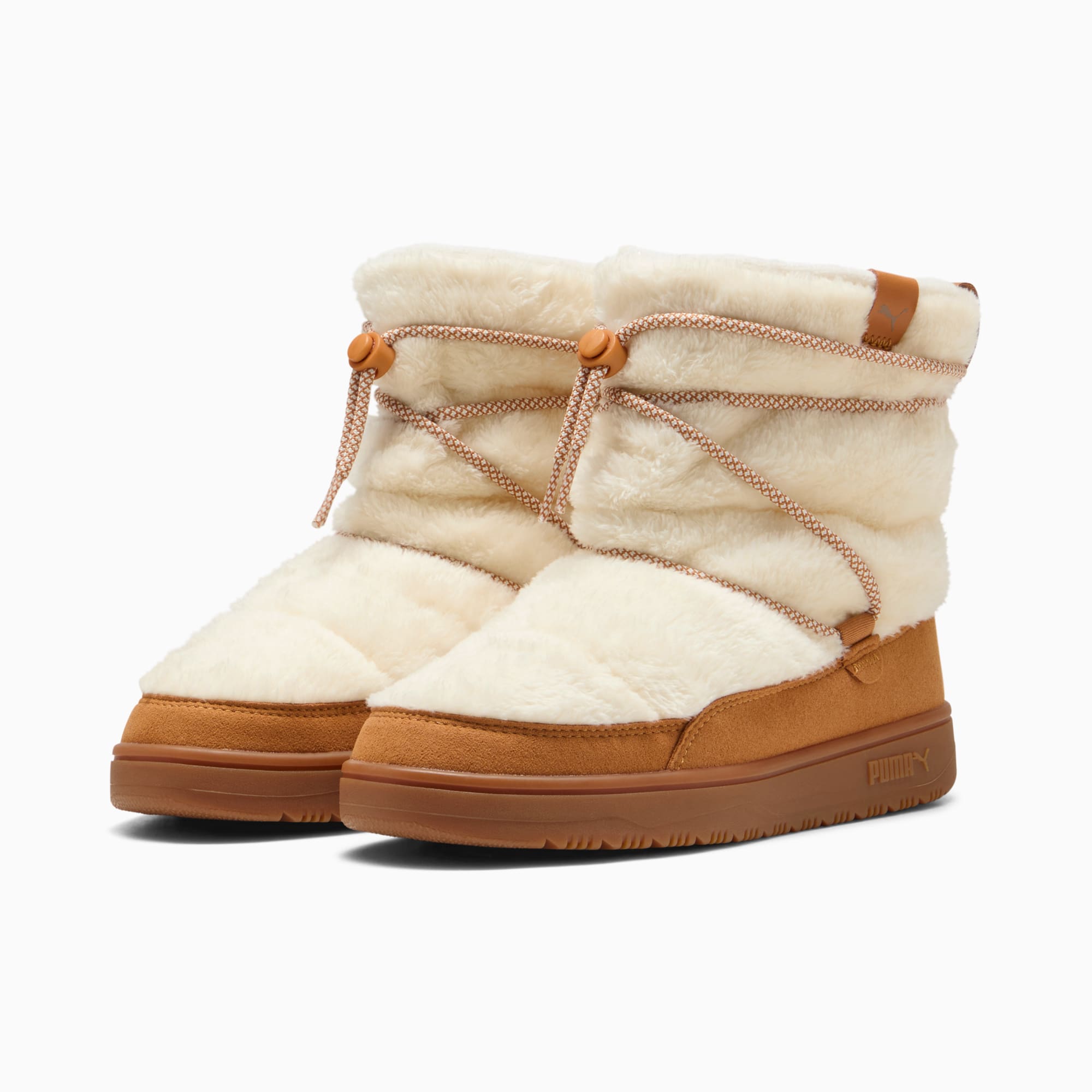 Creme PUMA Damenstiefel mit Kunstfell-Obermaterial und braunem Rand.