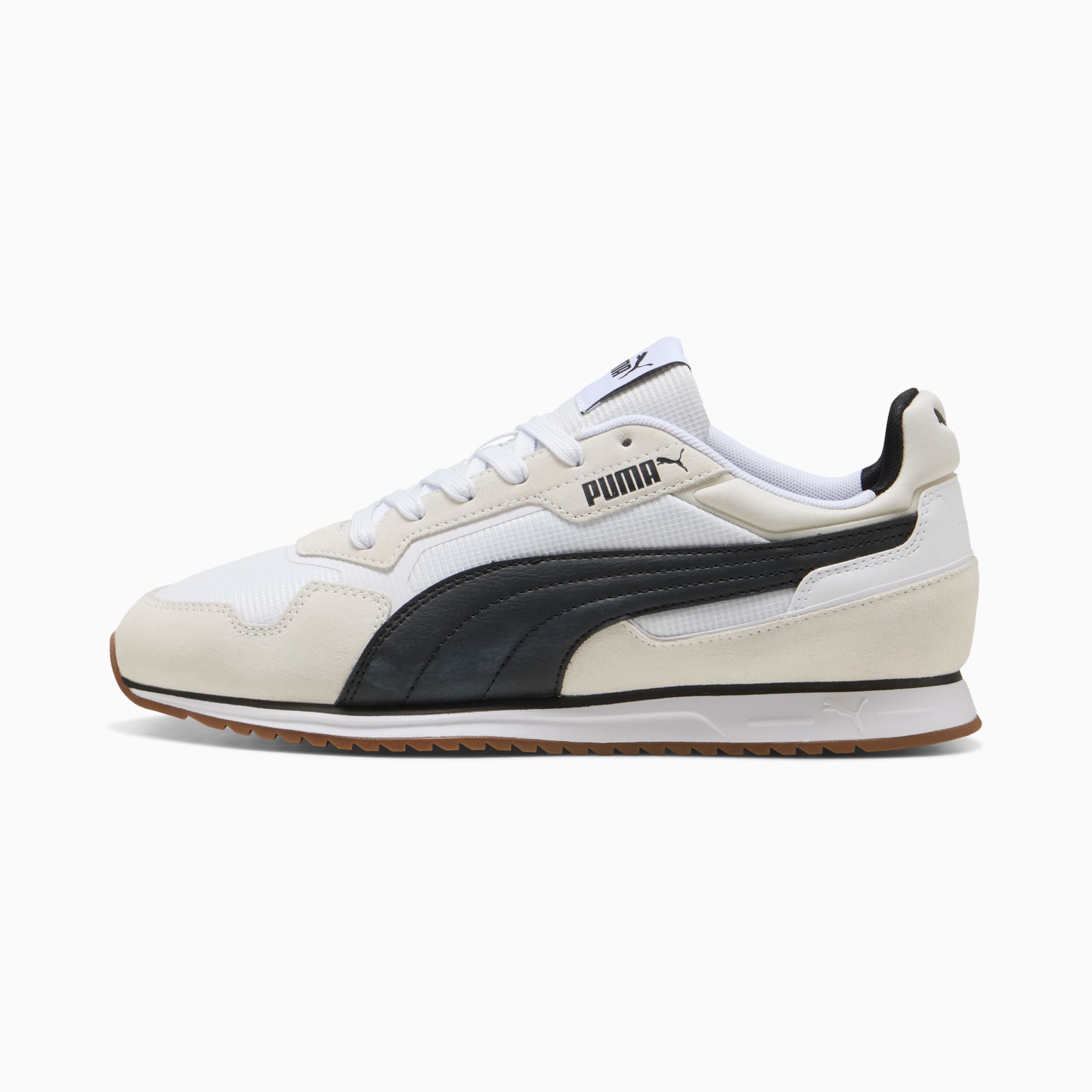White PUMA trainer with black stripe and gum sole for adults.