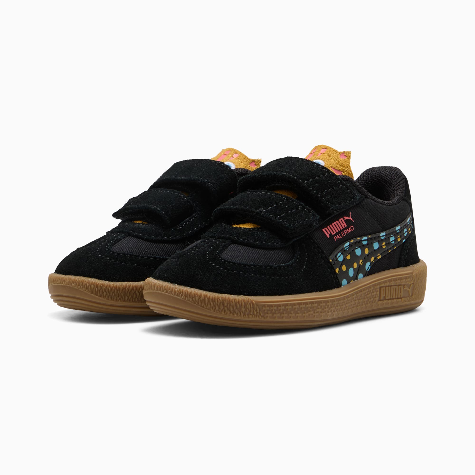 Chaussure PUMA Palermo noire pour enfant avec brides auto-agrippantes et pois colorés.