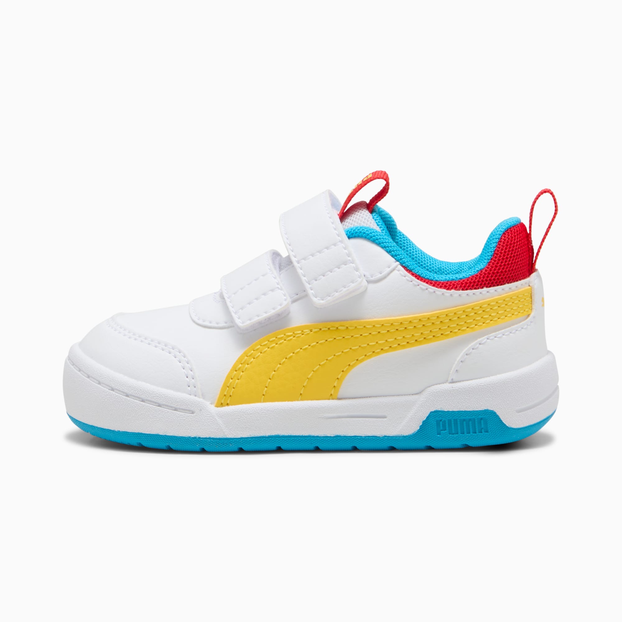 Basket PUMA blanche pour enfant avec bande jaune et fermetures auto-agrippantes.