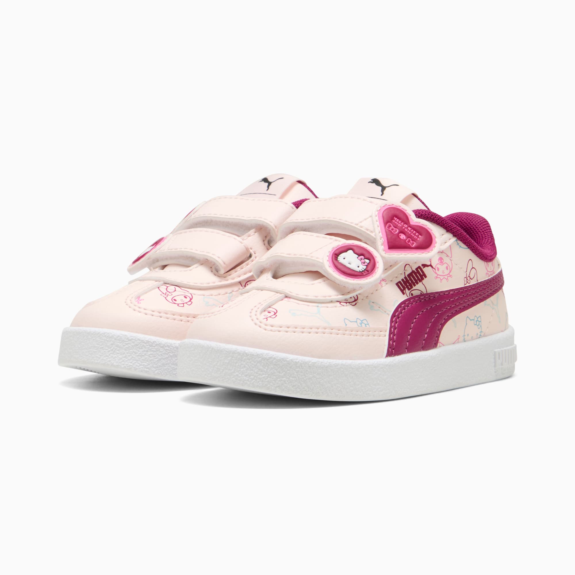 Hellrosa PUMA Trainer für Kleinkinder mit Hello Kitty Design und Klettverschlüssen.