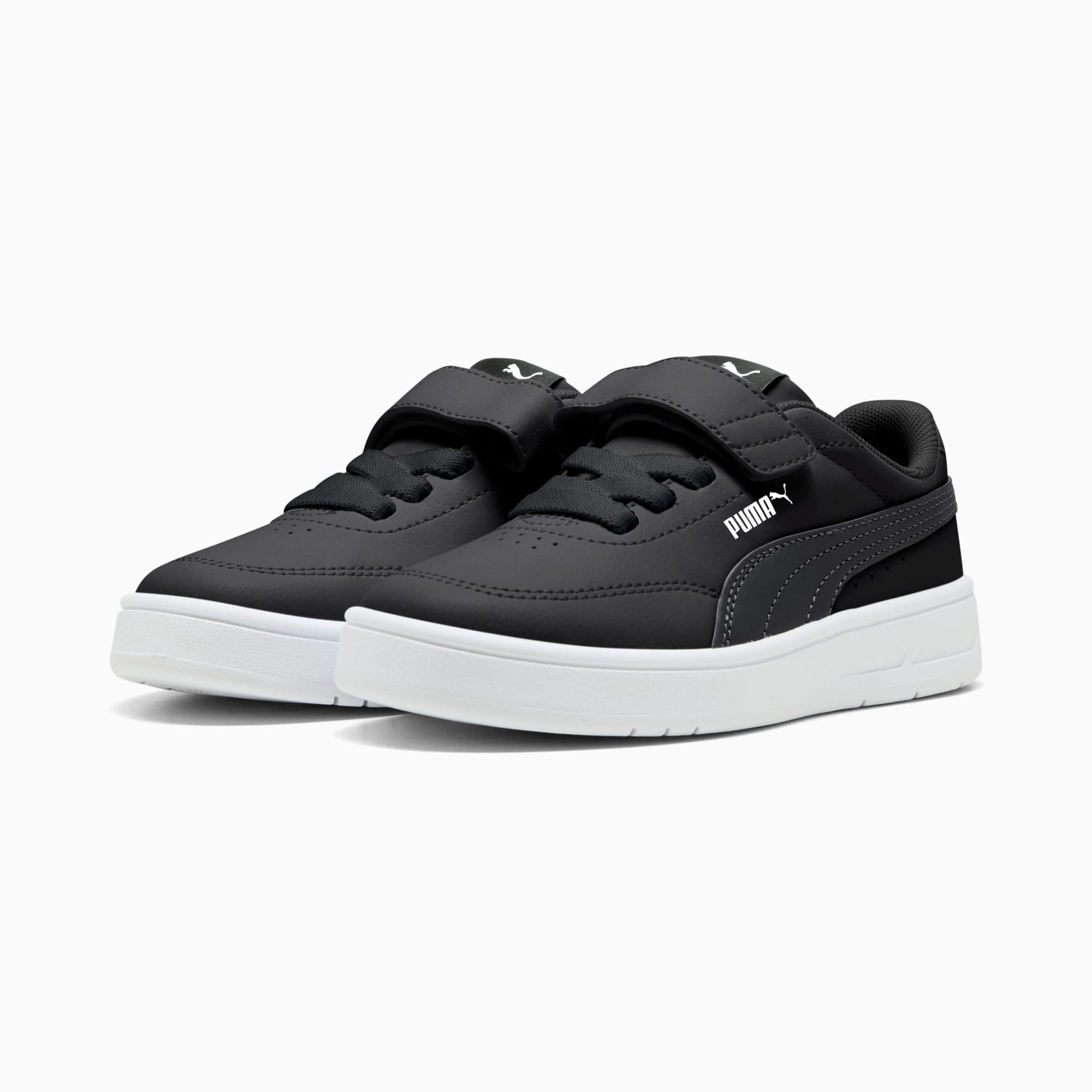 Sneaker PUMA nera, scarpa da bambino con cinturino a strappo e suola bianca.