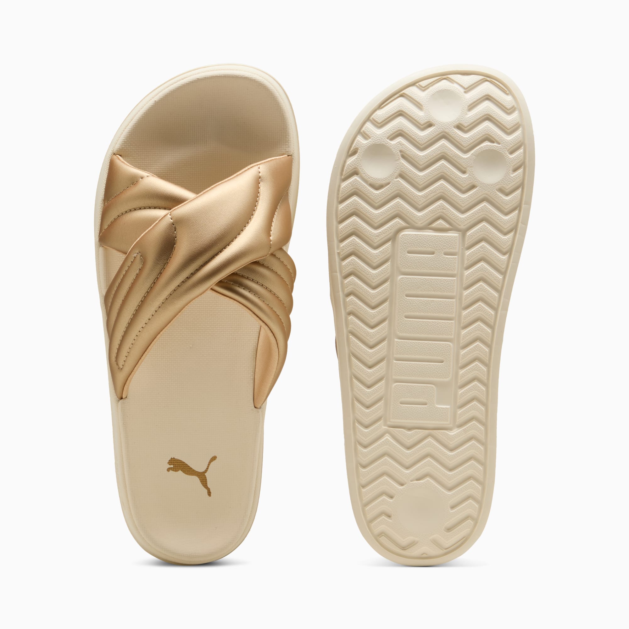 Sandale dorée PUMA pour femme avec bride croisée et semelle à motifs.