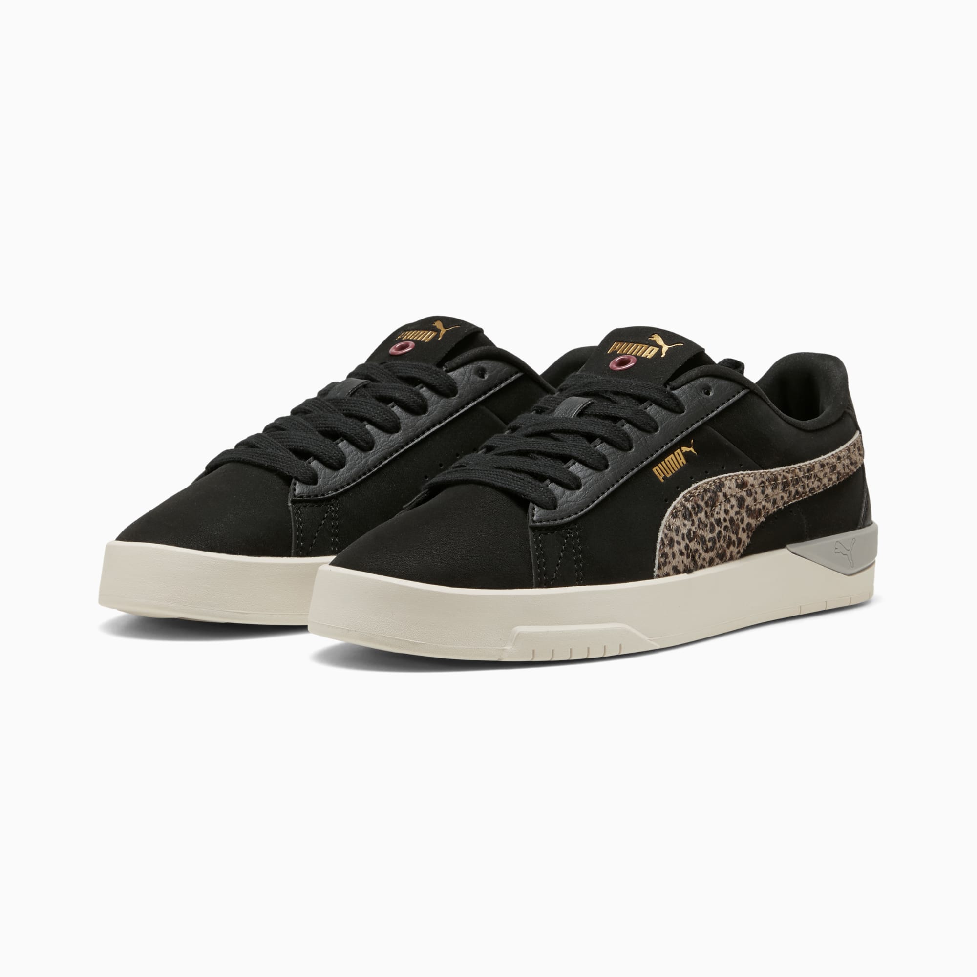 Baskets noires PUMA pour adultes avec motif léopard et fermeture à lacets.