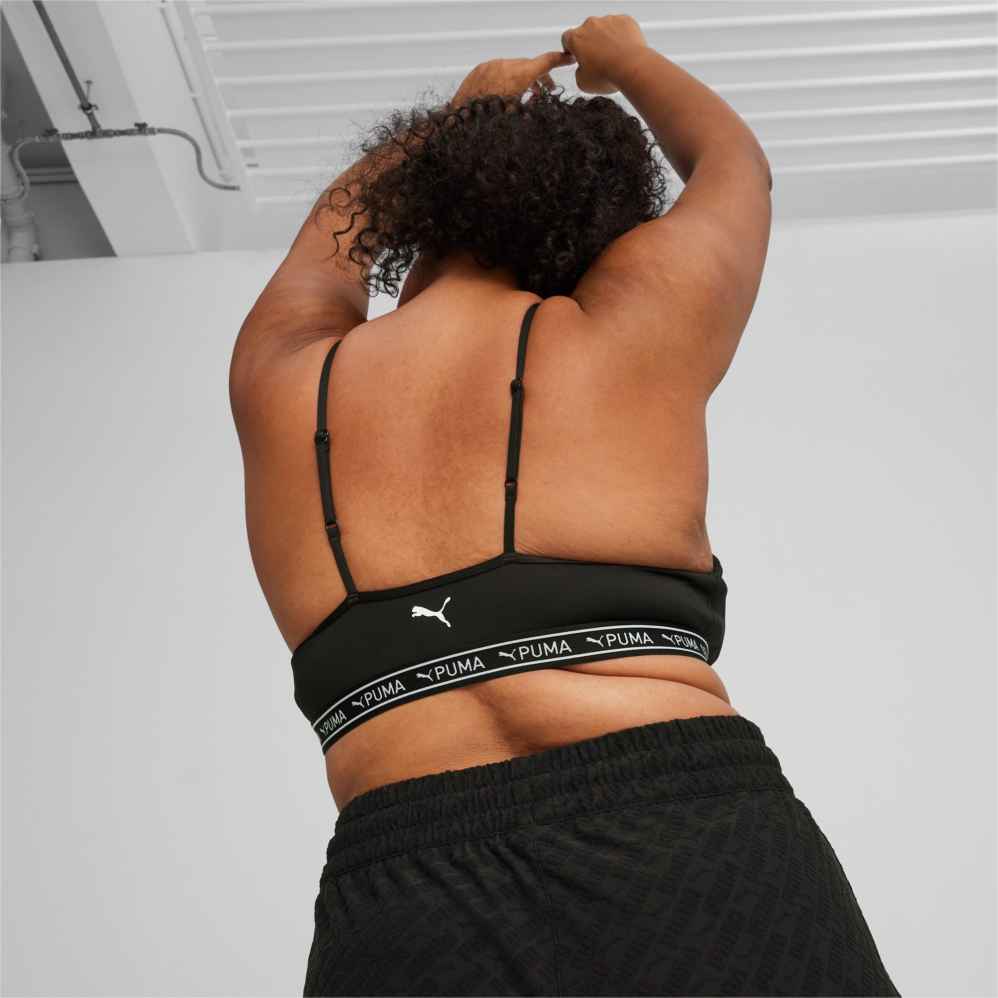Buy Puma women sportswear fit sleeveless training sports bra black Online