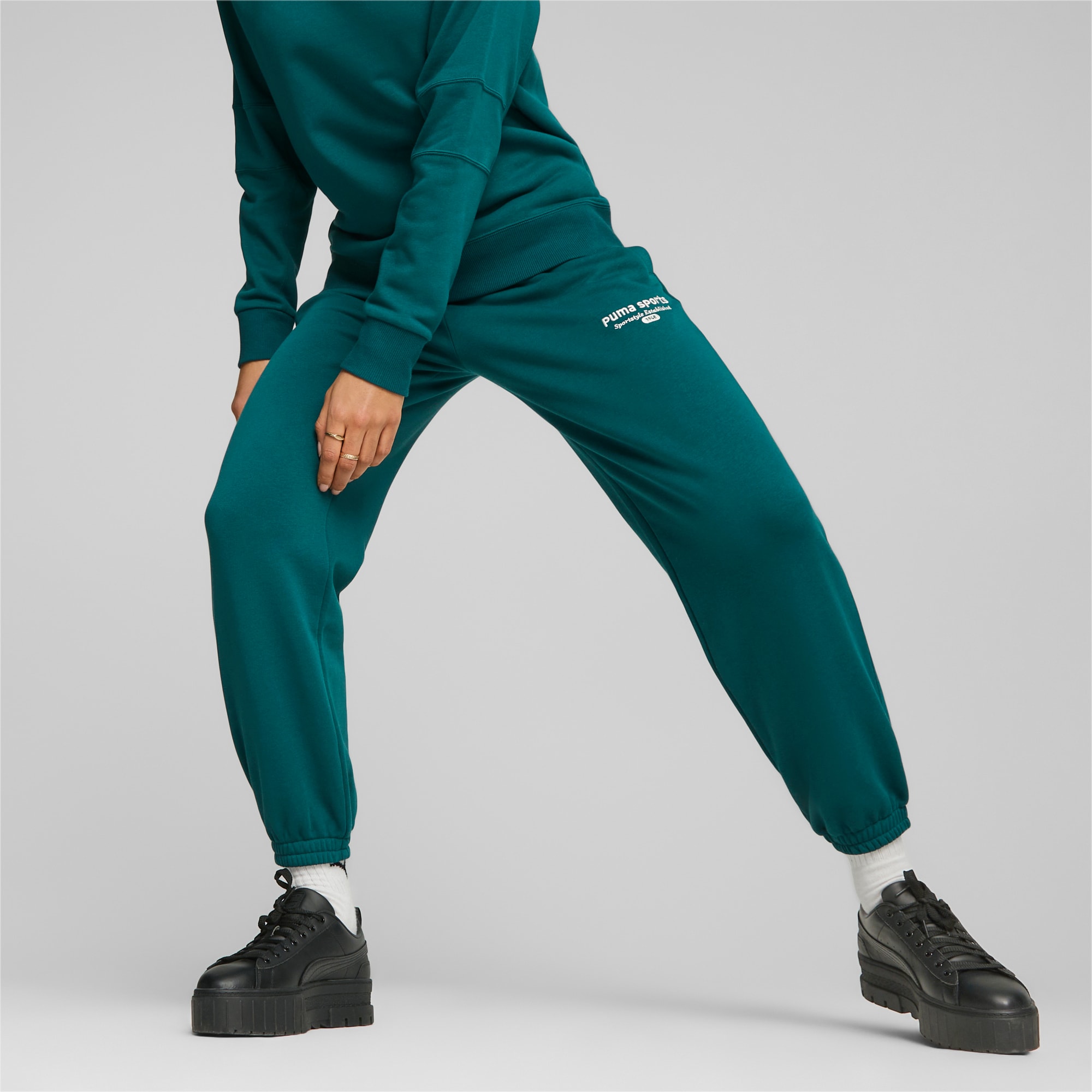 Puma sweatpants best sale with white stripe