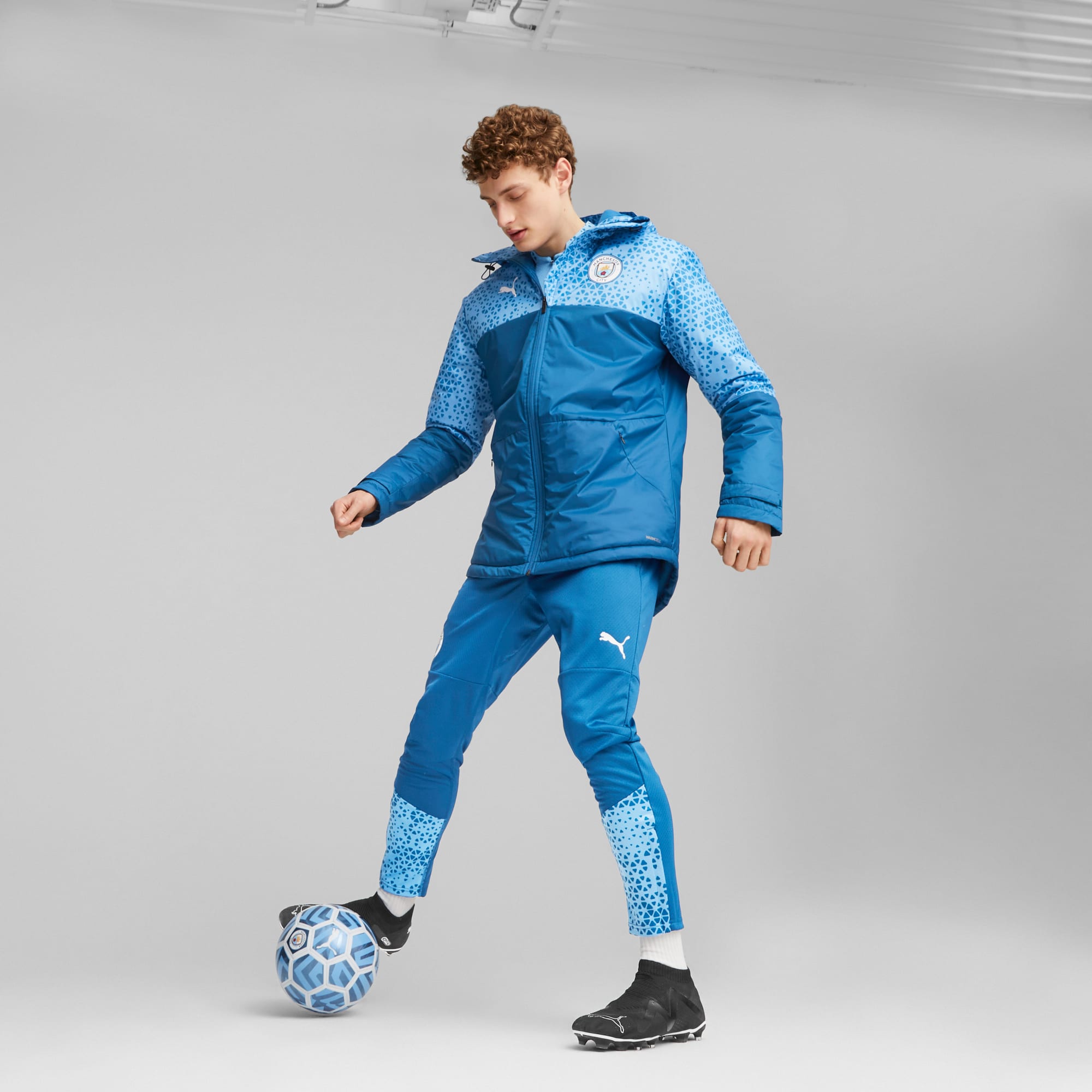 Manchester City Football Graphic Winter Jacket blue PUMA