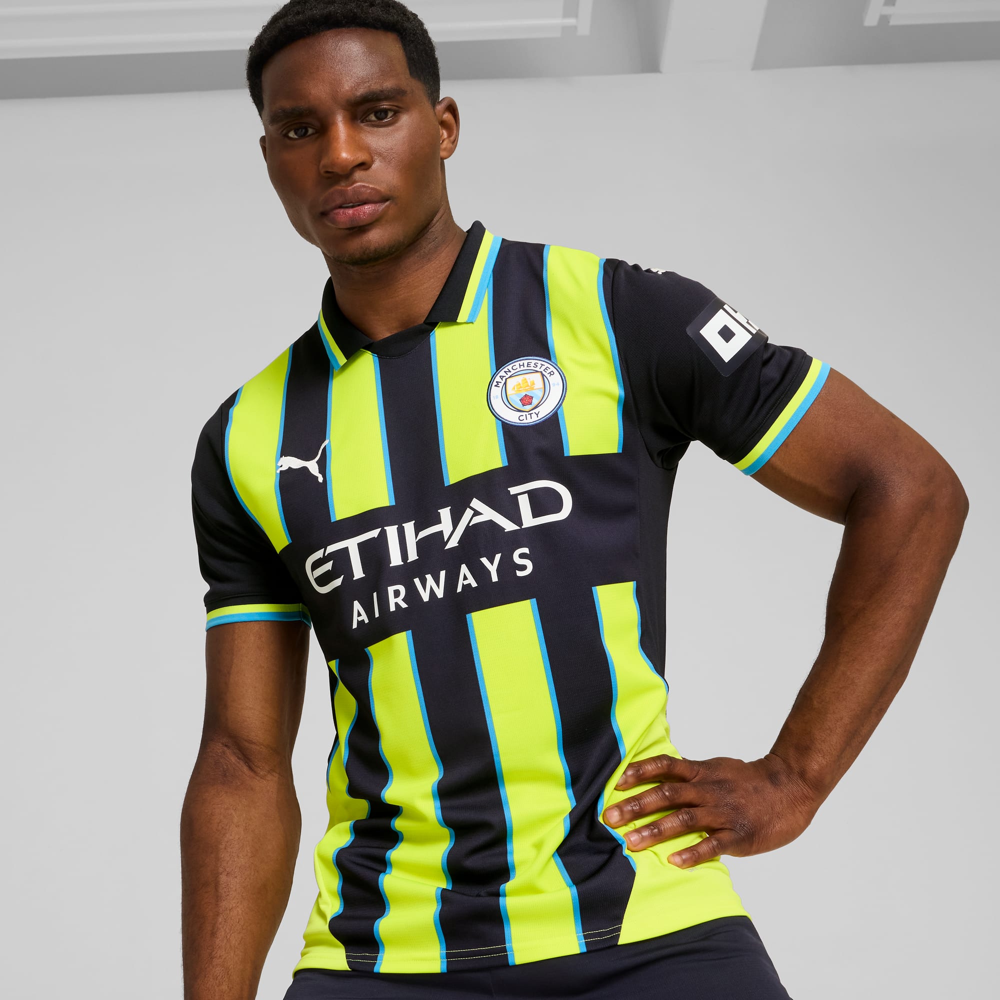 Man city t shirt on sale