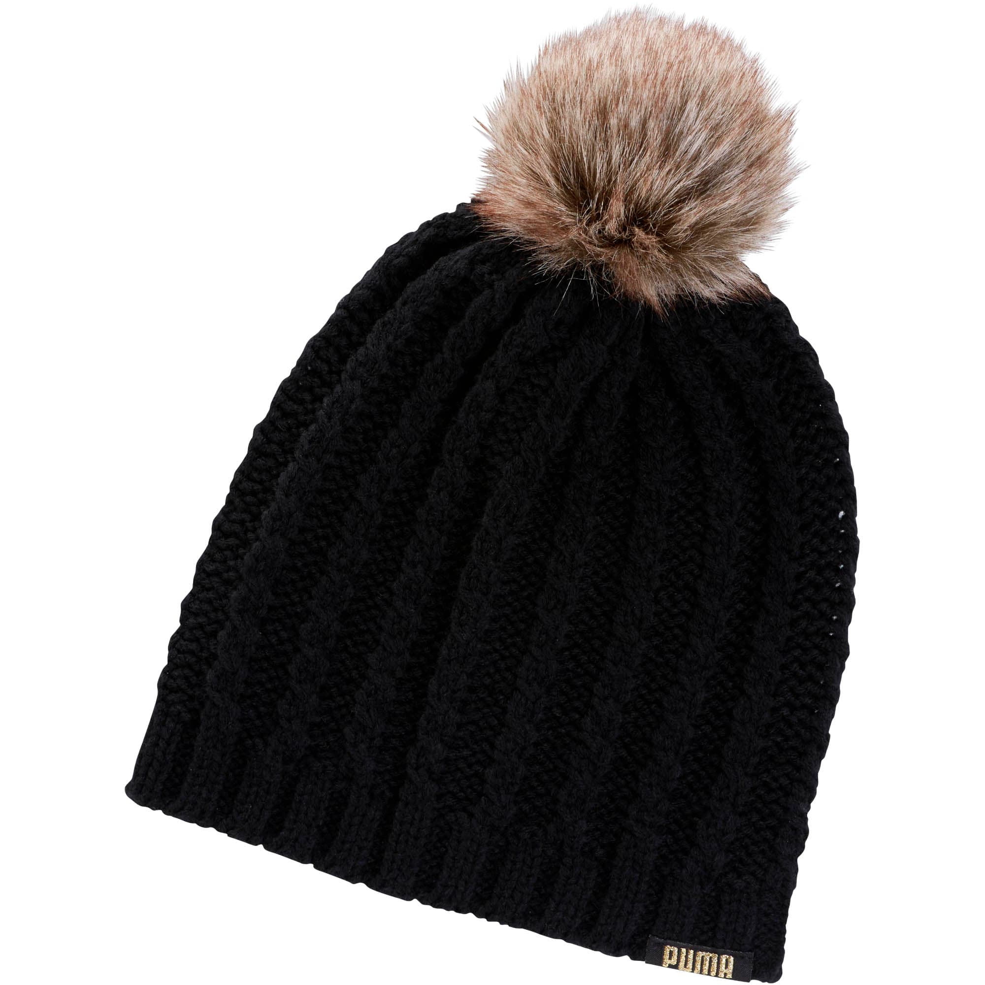 black wooly hat with fur pom pom