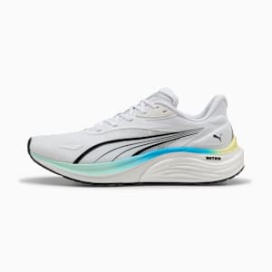 White PUMA running shoe with black stripes and a layered, colourful sole.