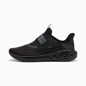 Black PUMA slip-on trainer featuring a prominent logo strap and textured sole.