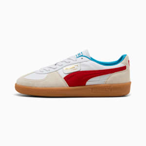 White PUMA trainer, adult, with red stripe and light brown sole.