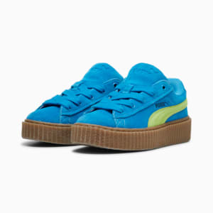 Puma suede negras top