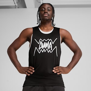 A model poses with hands on hips against a grey backdrop, wearing a black vest with a white logo.