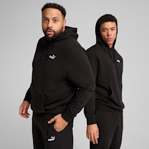 Two models pose in black hooded tops and track pants against a grey backdrop.