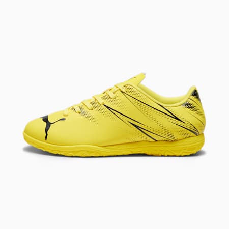 Puma yellow and black shoes top