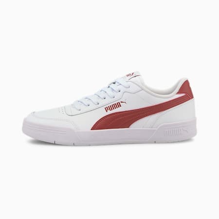 white and red puma trainers