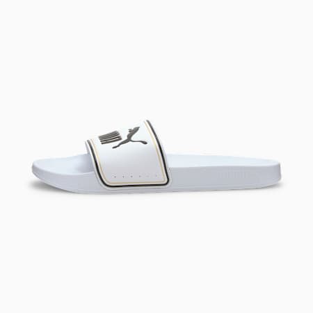 white and clear puma slides