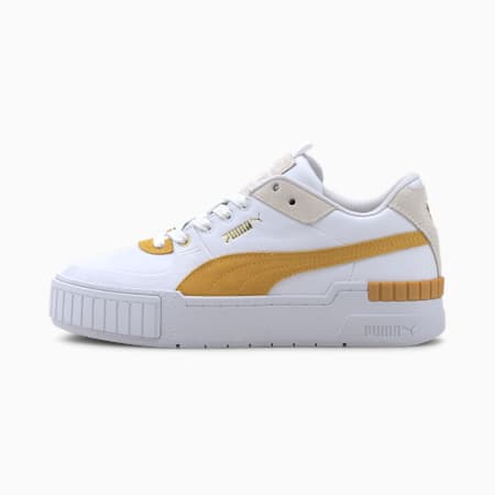 yellow and white puma shoes