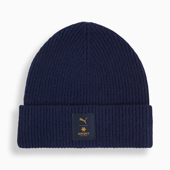 Navy PUMA beanie hat with a ribbed texture and 'SAYSKY' logo patch.