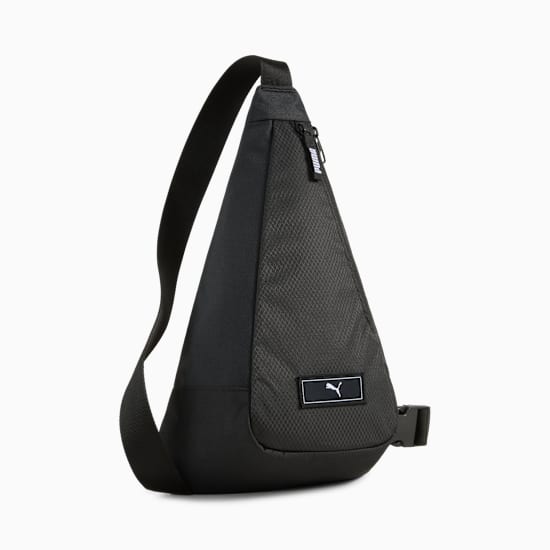 Black PUMA sling bag with adjustable strap and textured front panel.