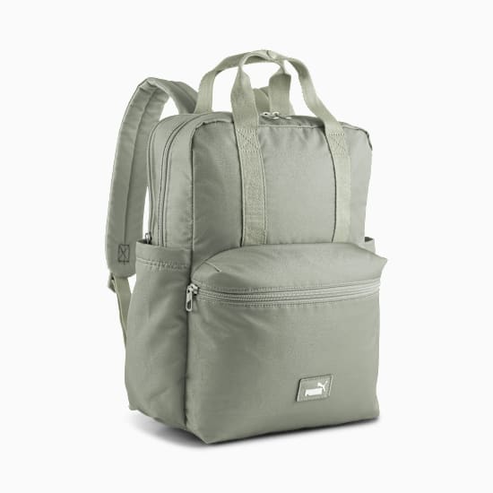 Grey PUMA women's backpack with zip pockets and carry handles on top.