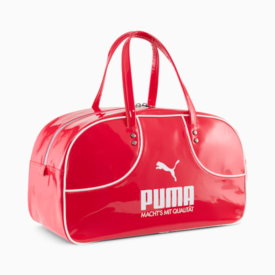 Red PUMA bowling bag with white trim, handles and logo detail.