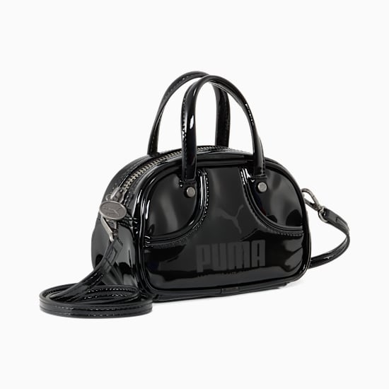 Black PUMA bowling bag, women's, with top handles and shoulder strap.