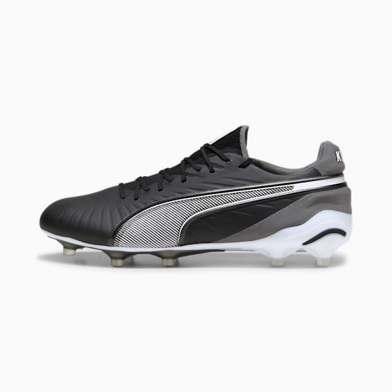 Black PUMA football boot with white formstrip and stud detailing.