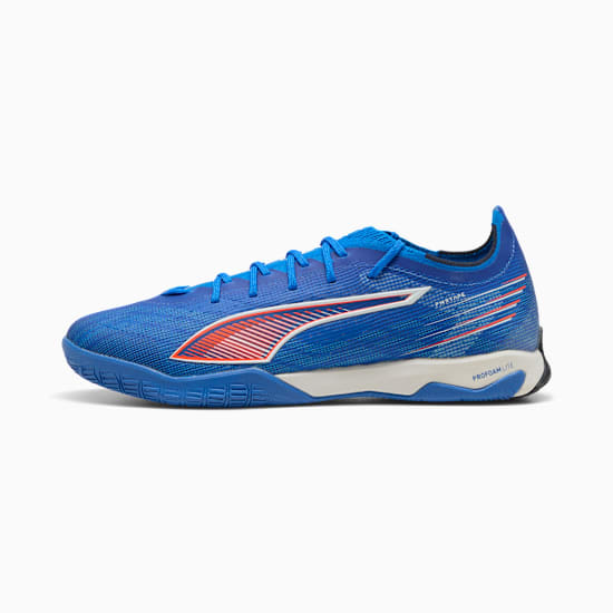 Blue PUMA adult shoe with orange stripe and lace-up closure.