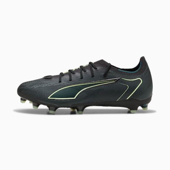 Black PUMA football boot featuring neon green accents for adults.