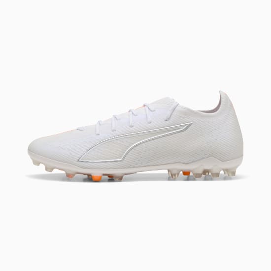 White PUMA football boot, adult size, with silver logo and orange studs.