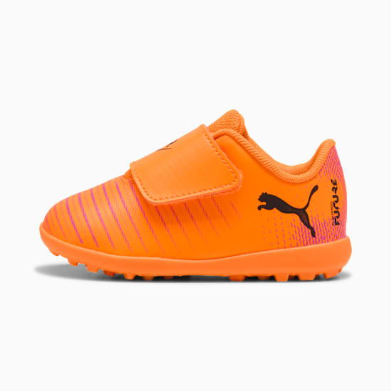 Orange PUMA football boot, infant size, with a touch-fastening strap and striped pattern.