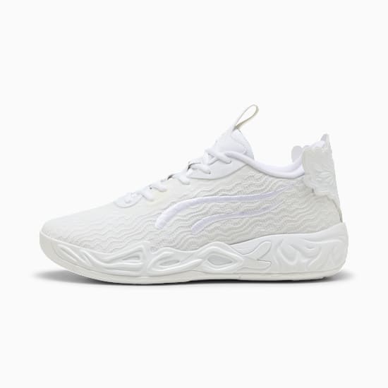 White PUMA trainer with wavy pattern and decorative heel detail.