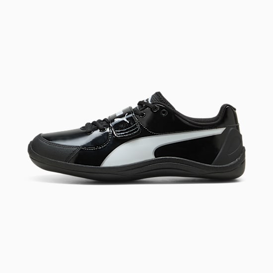 Black PUMA unisex shoe with a glossy finish, lace-up closure and side stripe detail.